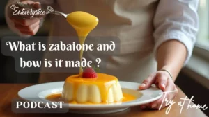 A creamy, golden Italian Zabaglione dessert served in a glass with fresh berries, featured on the Eat Every Slice podcast.